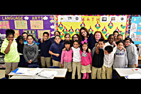 Mrs. Villasenor with students gathered together
