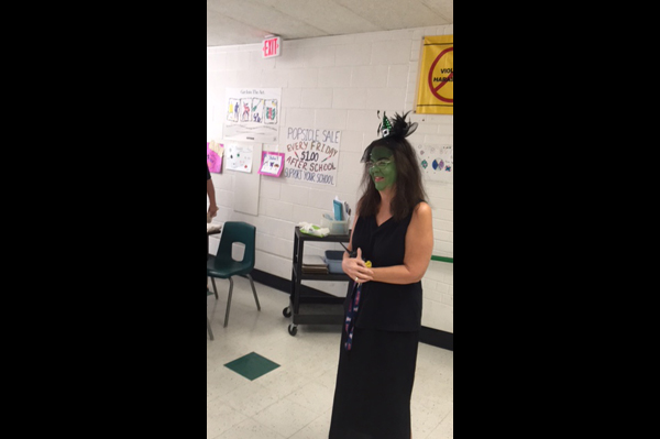 Teacher dressed as a witch