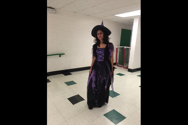 Student dressed in a witch costume