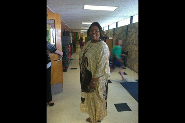 Teacher wearing traditional heritage clothing